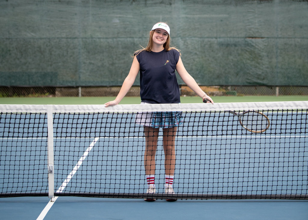 THE AGGIE BLUE PLAID SKORT— POLISHED PLAID FOR PLAY, PRACTICE, AND POST-MATCH PLANS