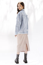 Distressed denim jacket