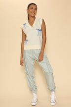 All over bow knit vest