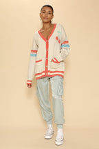 Oversized cherry varsity cardigan