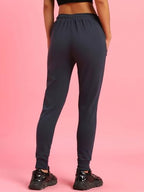 Bewakoof Womens Solid Cotton Blend Slim Fit Zipper Joggers