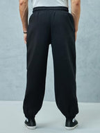 Bewakoof MenS Solid Super Loose Fit Cotton Blend Joggers