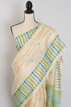 Rini: Cream Tussar Silk Saree with Blue & Green Motifs | Silk Mark Certified