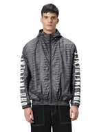 Bewakoof Air 1.0 Mens Typography Super Loose Fit Full Sleeve Hooded Neck Nylon Windcheater Jacket_ 601628 Grey XL