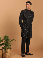 VASTRAMAY Mens Black Viscose Sherwani Set | Mirror work Embellished Viscose Indo Western And Pant Style Pyjama For Men.