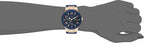 GUESS Women's Rose Gold-Tone Dial with Iconic Blue Stain Resistant Silicone Strap (Model: U0571L1)