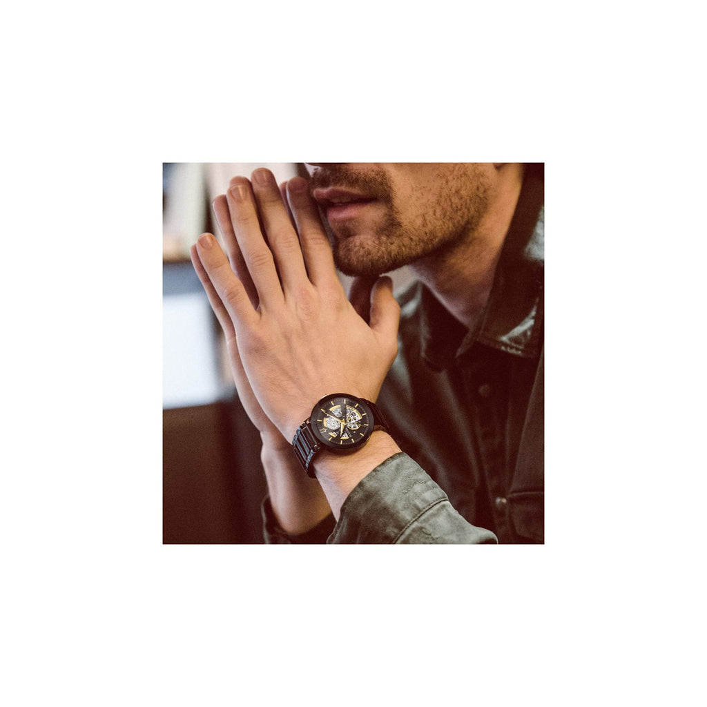 Bulova Men's Modern Black Ion-Plated Stainless Steel 3-Hand Automatic Watch, Skeleton Dial with Gold Tone Accents Style: 98A203