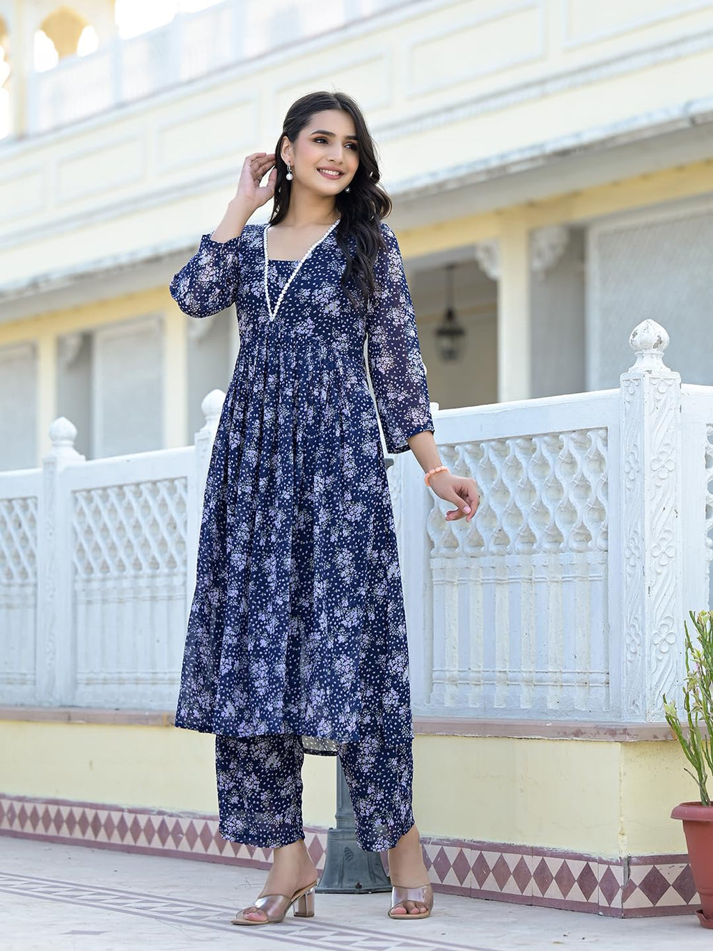 Varanga Women Navy Blue Allover Floral Printed Pleated Empire Kurta Paired With Tonal Bottom