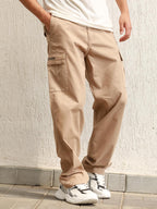 Hubberholme Men Taupe Cotton Loose Fit Mid-Rise Trousers