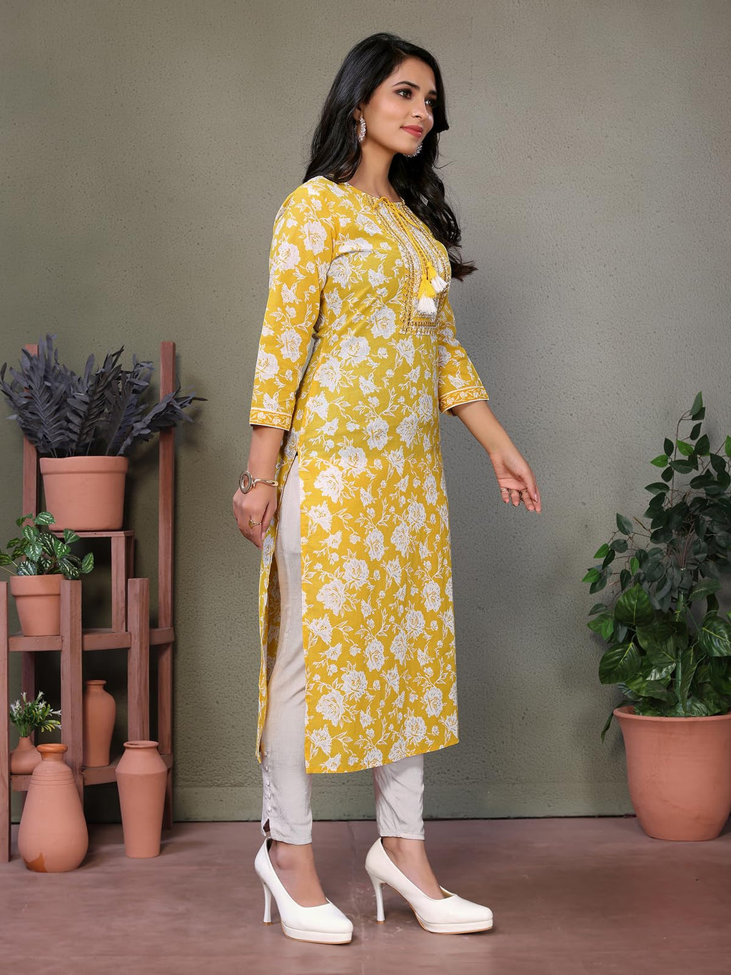 rangita Yellow Cotton Calf Length Embroidered Straight Kurti