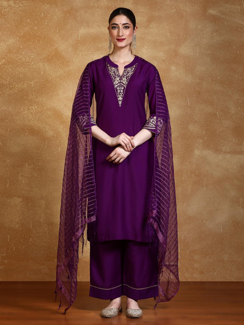Varanga Zari Embroidered Neck Kurta With Trouser And Dupatta.