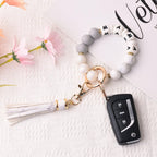 BAOSIWA Women Silicone Keychain Bracelet Beaded Wristlet Key Ring Christmas White Bangle Chains with Leather Tassel