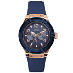 GUESS Women's Rose Gold-Tone Dial with Iconic Blue Stain Resistant Silicone Strap (Model: U0571L1)