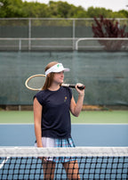 THE AGGIE BLUE PLAID SKORT— POLISHED PLAID FOR PLAY, PRACTICE, AND POST-MATCH PLANS
