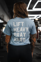 Lift Heavy. Pray Hard. - Baby Blue Women's Crop Tee