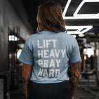 Lift Heavy. Pray Hard. - Baby Blue Women's Crop Tee