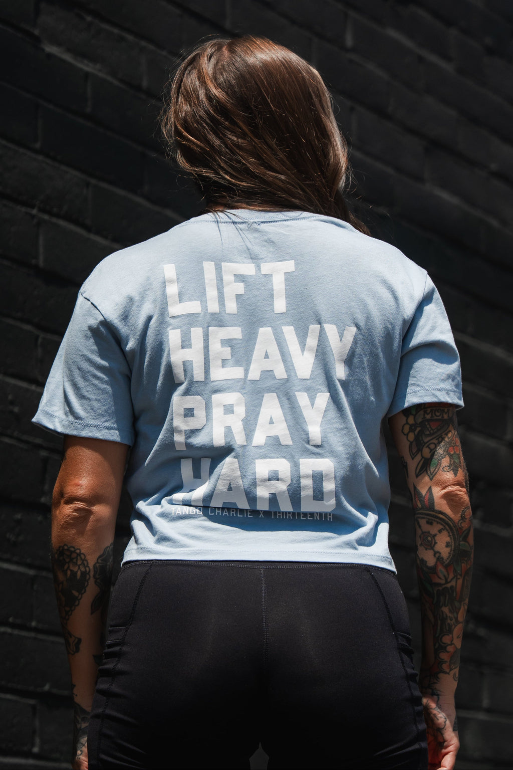Lift Heavy. Pray Hard. - Baby Blue Women's Crop Tee