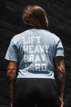 Lift Heavy. Pray Hard. - Baby Blue Women's Crop Tee
