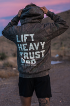 Lift Heavy. Trust God. - Premium Darkwood Camo Hoodie