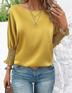 Smocked cuffs  Long sleeve blouse