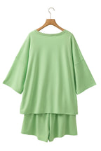 Meadow Mist Green Plus Size V Neck Drop Shoulder Tee Loose Shorts 2pcs Outfit