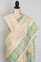 Rini: Cream Tussar Silk Saree with Blue & Green Motifs | Silk Mark Certified